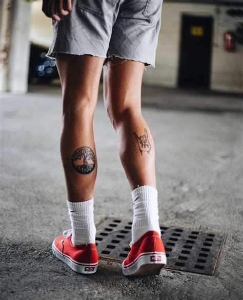 tattoo design on legs|leg tattoos men small.